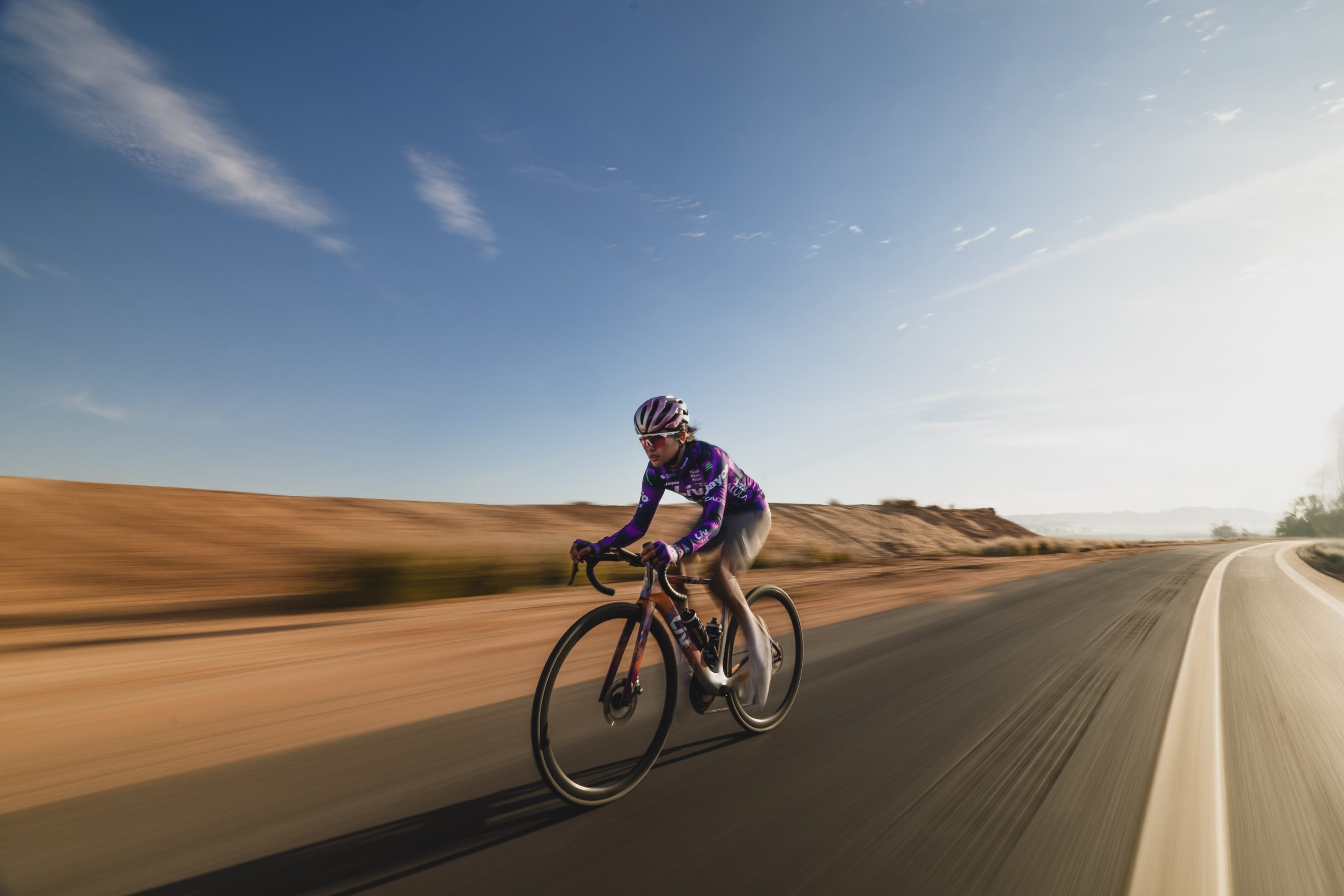 Moroj Adil training on a road through open farmland in Europe